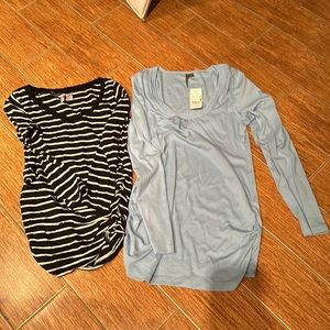 Bundle of two small maternity shirts.